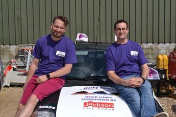 A photo of Wacky Racer's Warren and Jim with their car, raising funds for Pancreatic Cancer Action