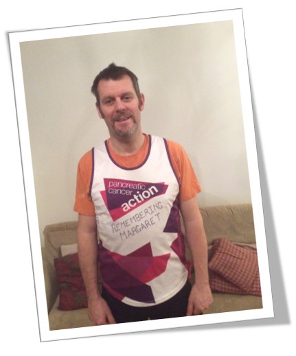 A picture of Steve Morton wearing his Pancreatic Cancer Action running vest