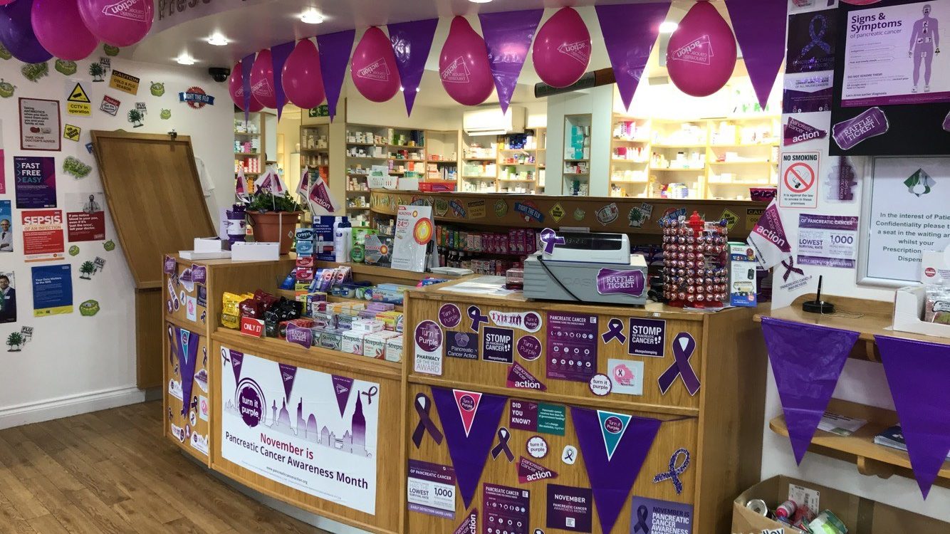 urple Pancreatic Cancer Action balloons and decorations in Knights Oakwood Pharmacy for Pancreatic Cancer Action's Turn it Purple campaign
