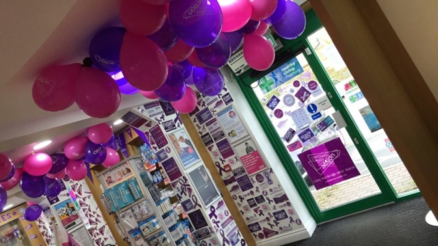 urple Pancreatic Cancer Action balloons and decorations in Knights Oakwood Pharmacy for Pancreatic Cancer Action's Turn it Purple campaign